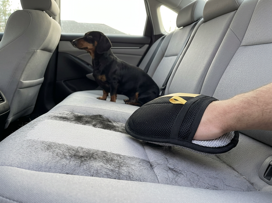 Sausage Glove cleaning a car seat