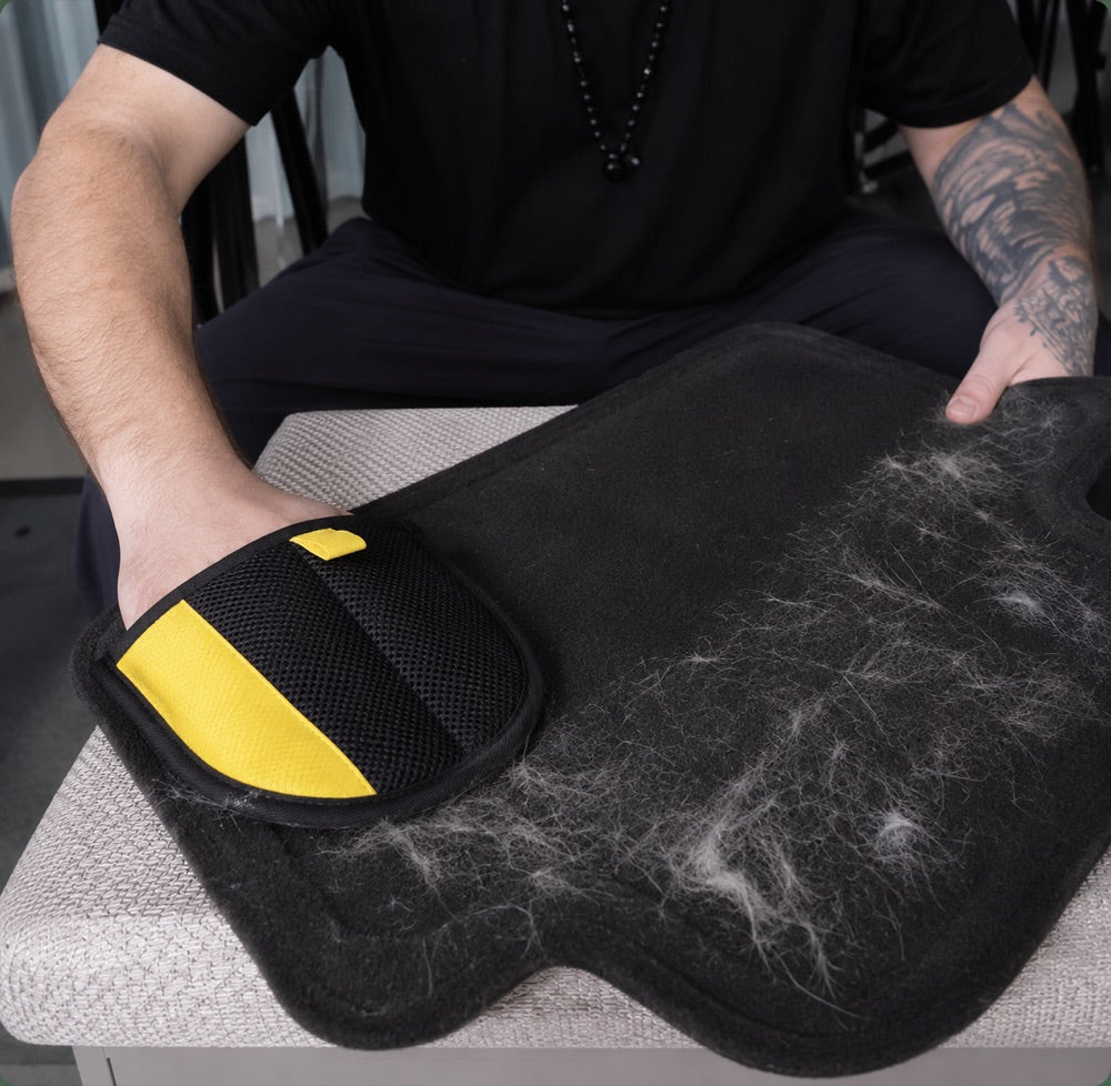 Using the Sausage Glove on a hair-covered car mat and seat